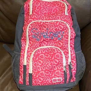 EastSport pink and grey monogrammed Sydney backpack. EUC